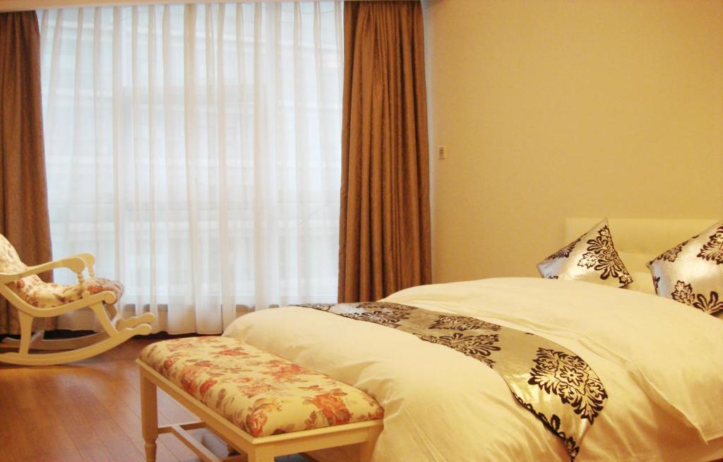 Hangzhou Yilin Hotel Apartment Kamer foto